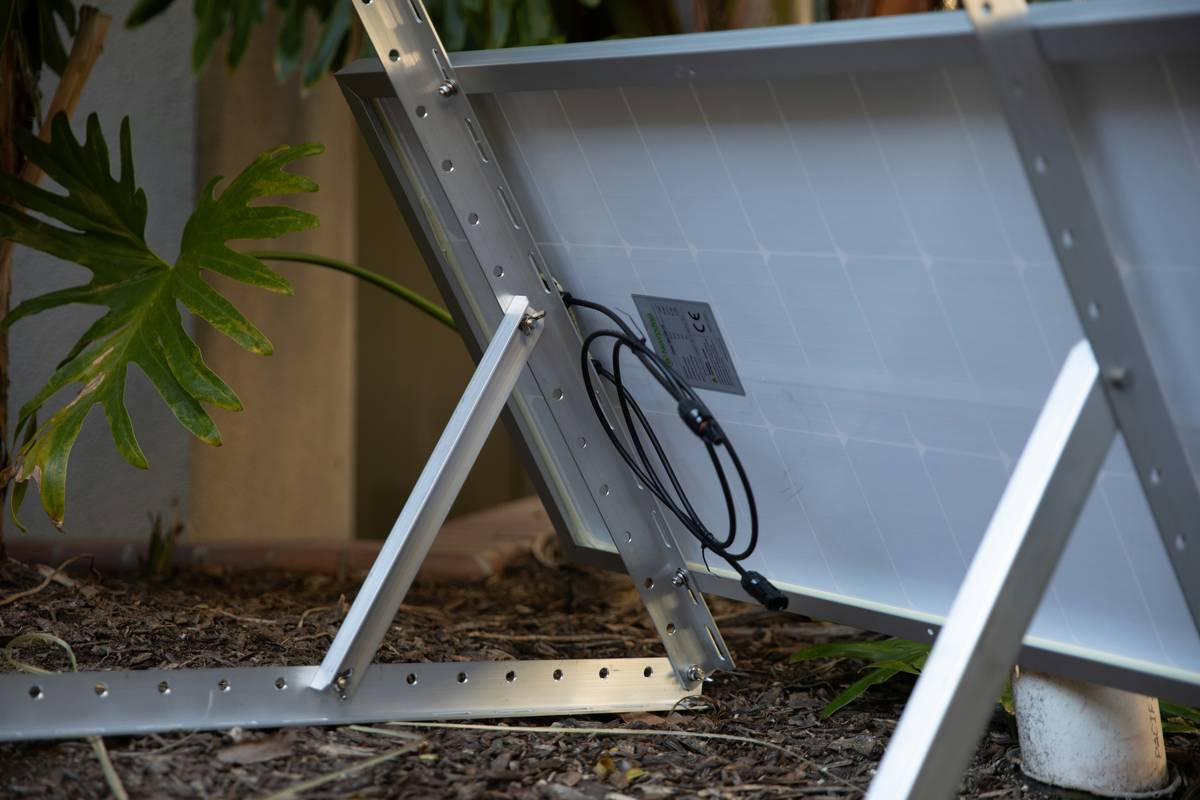 Close-up of UV-resistant solar panel power cable connected to rooftop PV modules